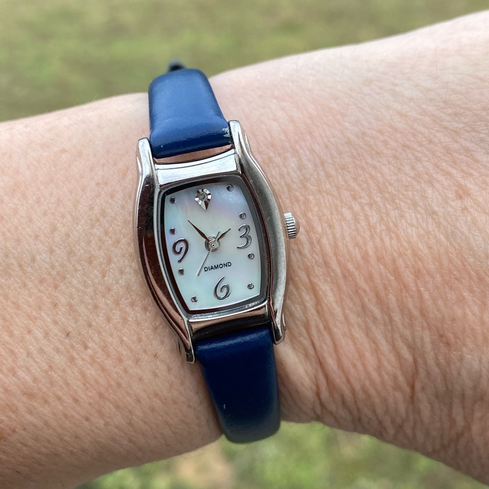 Blue genuine leather watch with mother of Pearl face and genuine Diamond accent